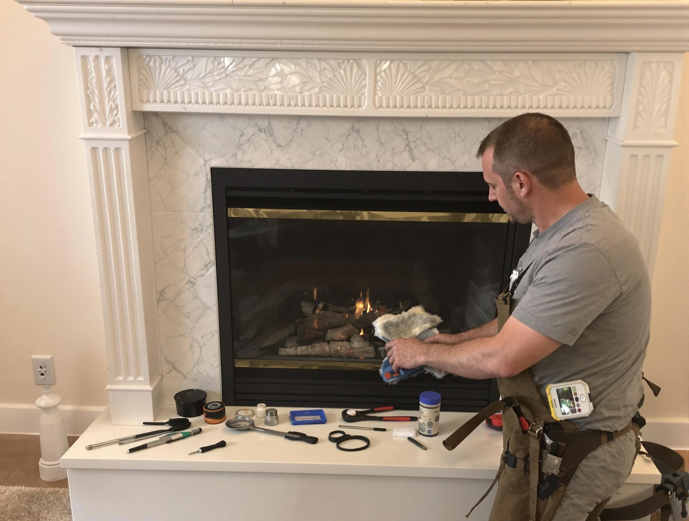 Saugus Chimney Sweep performing fireplace maintenance in Saugus, MA